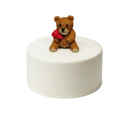 Knudelbär sizend Braun