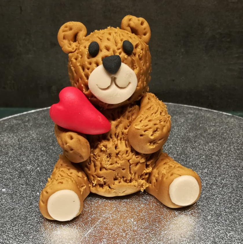 Knuddelbär mit Herz modelliert braun
